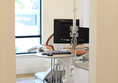 Boise Dentistry Co. uses modern technology to save your smile One of our treatment rooms with a computer monitor in it