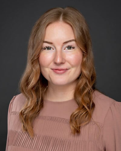 Headshot of Kinli, our regional manager