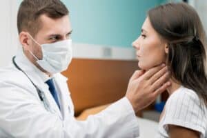 doctor checking TMJ for issues